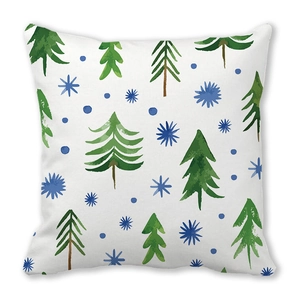Details des Weihnachtskissenbezugs mit Aquarell-Kiefern und blauen Schneeflocken