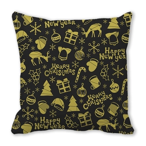 Detail of Christmas pillow cover with golden reindeer and snowflake prints on black background