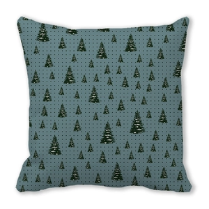 Detail of Christmas tree patterns and polka dots on soft peach skin pillowcase texture