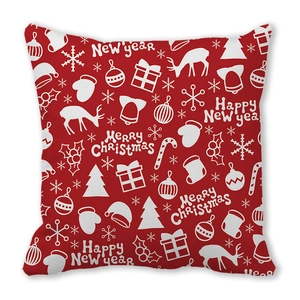 Close-up of red Christmas pillowcase featuring white festive patterns and holiday icons