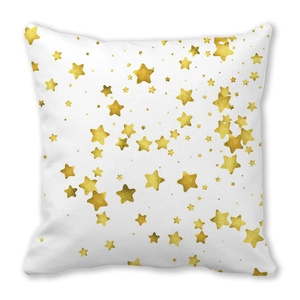 Detail of square pillowcase with gold watercolor star patterns on a white base