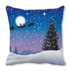 Dettaglio fodera cuscino natalizio con slitta di Babbo Natale sopra la notte innevata