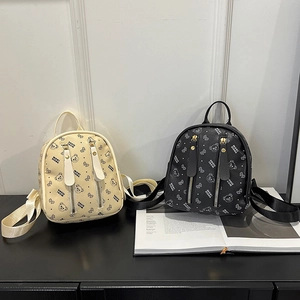 Sac à dos mignon avec motif ours et double fermeture éclair en crème et noir
