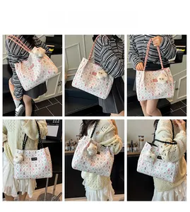 Floral canvas tote bags with cute cartoon prints and plush charms in a lifestyle setting