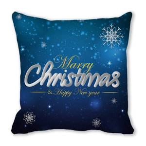 Détail macro de la taie de coussin bleu marine avec flocons et texte de Noël