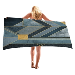 Thick beach towel with luxury geometric marble patterns and golden lines