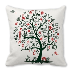 Detail of Christmas throw pillow featuring red and black hand-drawn festive tree pattern