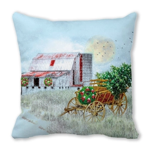 Detailed view of square pillow case featuring a winter Christmas barn and snowy landscape