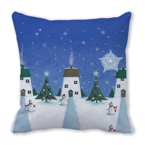Macro detail of Christmas pillowcase featuring snowman and tree print on peach skin fabric