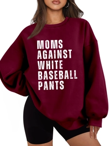 Detail of the high-quality white letter print on a burgundy oversized fleece sweatshirt