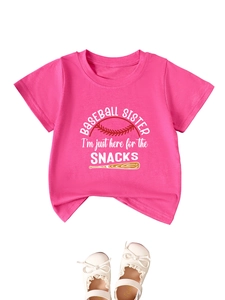 Detail of pink cotton kids t-shirt with Baseball Sister print and lace Mary Jane shoes