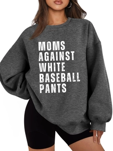 Close-up of white slogan print on a dark gray thick fleece sweatshirt for women