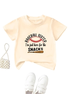 Detail view of beige cotton T-shirt featuring Baseball Sister and snacks slogans