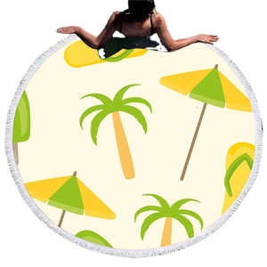 Round beach towel with white tassels featuring palm trees and summer holiday elements