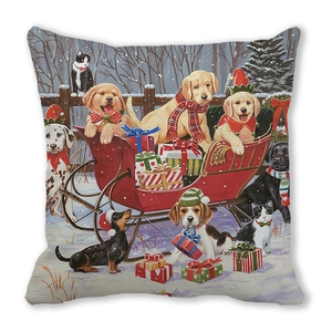 Close-up of festive Christmas pillowcase with cats and puppies in a red snowy sled