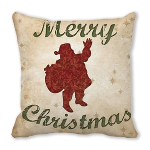 Detail of Christmas pillow cover featuring retro Santa Claus silhouette and Merry Christmas text