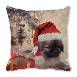 Close-up of a festive Christmas pillow cover with a cute puppy wearing a Santa hat