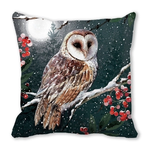 Detail of owl illustration on Christmas cushion cover with snowy branch and berries