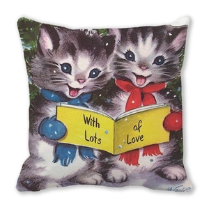 Detail of cute Christmas cats cushion cover with With Lots of Love printed text