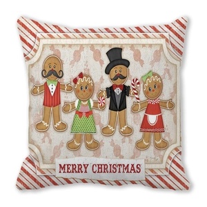 Detail of gingerbread family print on festive Merry Christmas square cushion cover