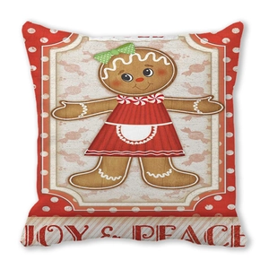 Detail of gingerbread girl print on Christmas cushion cover with JOY & PEACE text