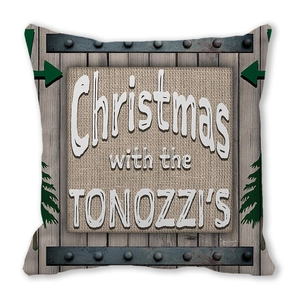 Detail of rustic Christmas pillow cover featuring vintage wood grain and tree motifs