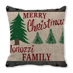 Detail of Christmas peach skin pillowcase with green trees and festive lettering