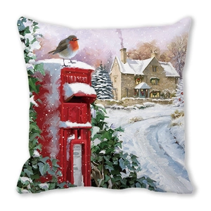 Detail of Christmas pillowcase featuring a snowy village scene with a red postbox and robin