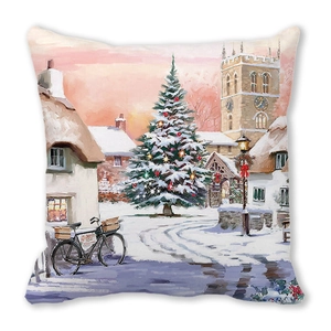 Detailed view of Christmas pillowcase featuring a snowy village and festive tree scenery