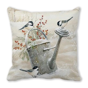 Close-up of Christmas reindeer pillowcase with vintage bird and pine branch print