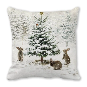 Close-up of Christmas reindeer pillowcase featuring snowy forest and rabbits print