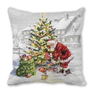 Detail of Christmas pillow cover with Santa Claus and tree print on peach skin fabric