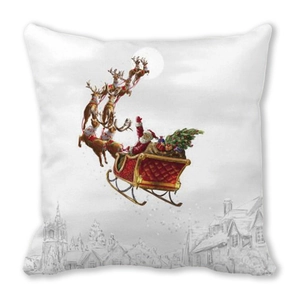 Close-up of Santa Claus on a reindeer sleigh print on a Christmas cushion cover