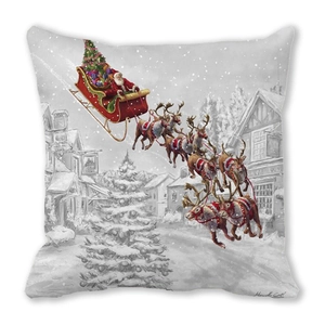 Macro view of Christmas pillow cover showing Santa on a reindeer sleigh over a snowy village
