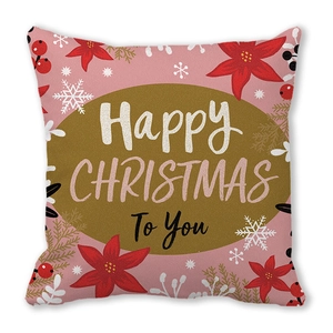 Detail of pink Merry Christmas pillowcase featuring red poinsettia and snowflake patterns