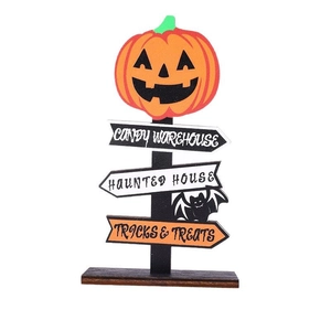 Halloween wooden pumpkin signpost with haunted house and candy warehouse direction signs