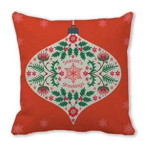 Detail of red Christmas pillowcase featuring Season's greetings text and floral pattern