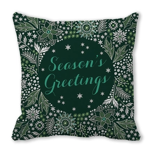 Detailed view of Season's Greetings artistic typography on green festive pillowcase