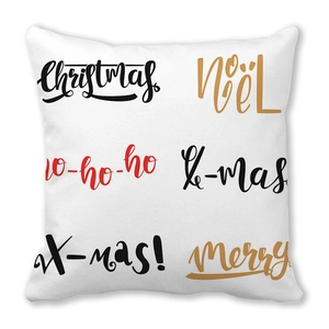 Detail of Christmas pillowcase with festive red and black artistic holiday typography