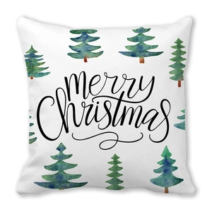 Detail of Christmas pillowcase with watercolor evergreen tree and Merry Christmas text