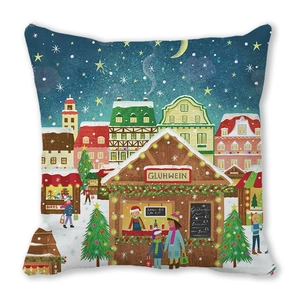 Detail of Christmas pillow cover showing vibrant market print and hidden zipper closure