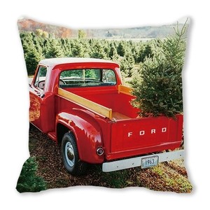 Detail of red vintage truck with Christmas tree on peach skin pillowcase