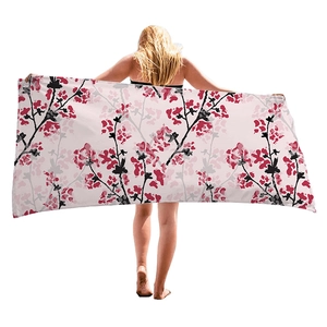 Serviette de plage en microfibre avec motif fleur de cerisier sur fond rose clair