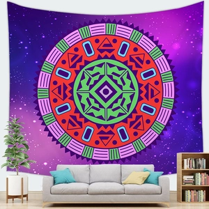 Bohemian starry sky mandala tapestry hanging on a modern minimalist living room wall