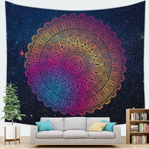 Detailed starry galaxy mandala tapestry hanging as a backdrop in a modern living room