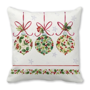 Macro detail of Christmas pillow case featuring festive ornaments and holly berry prints