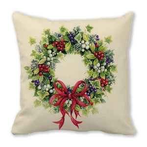 Christmas wreath throw pillow cover with red berries and ribbon on peach skin fabric