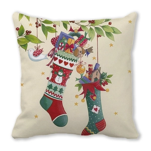 Détail de la taie d'oreiller de Noël avec motifs festifs sur tissu peau de pêche doux