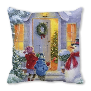 Detalle de funda de cojín navideño con escena de acuarela de niños y muñeco de nieve