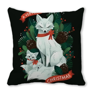 Detail of Christmas pillow cover with white foxes, pine cones, and berries on black background